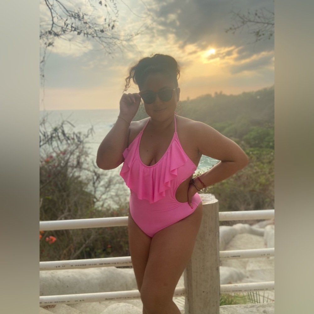 Pink one piece swimsuit with open back